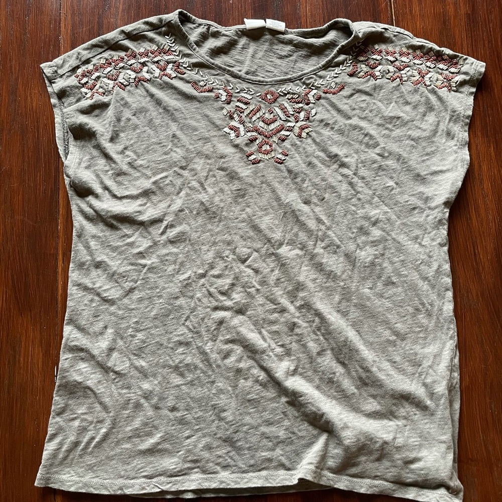 Beaded shirt.